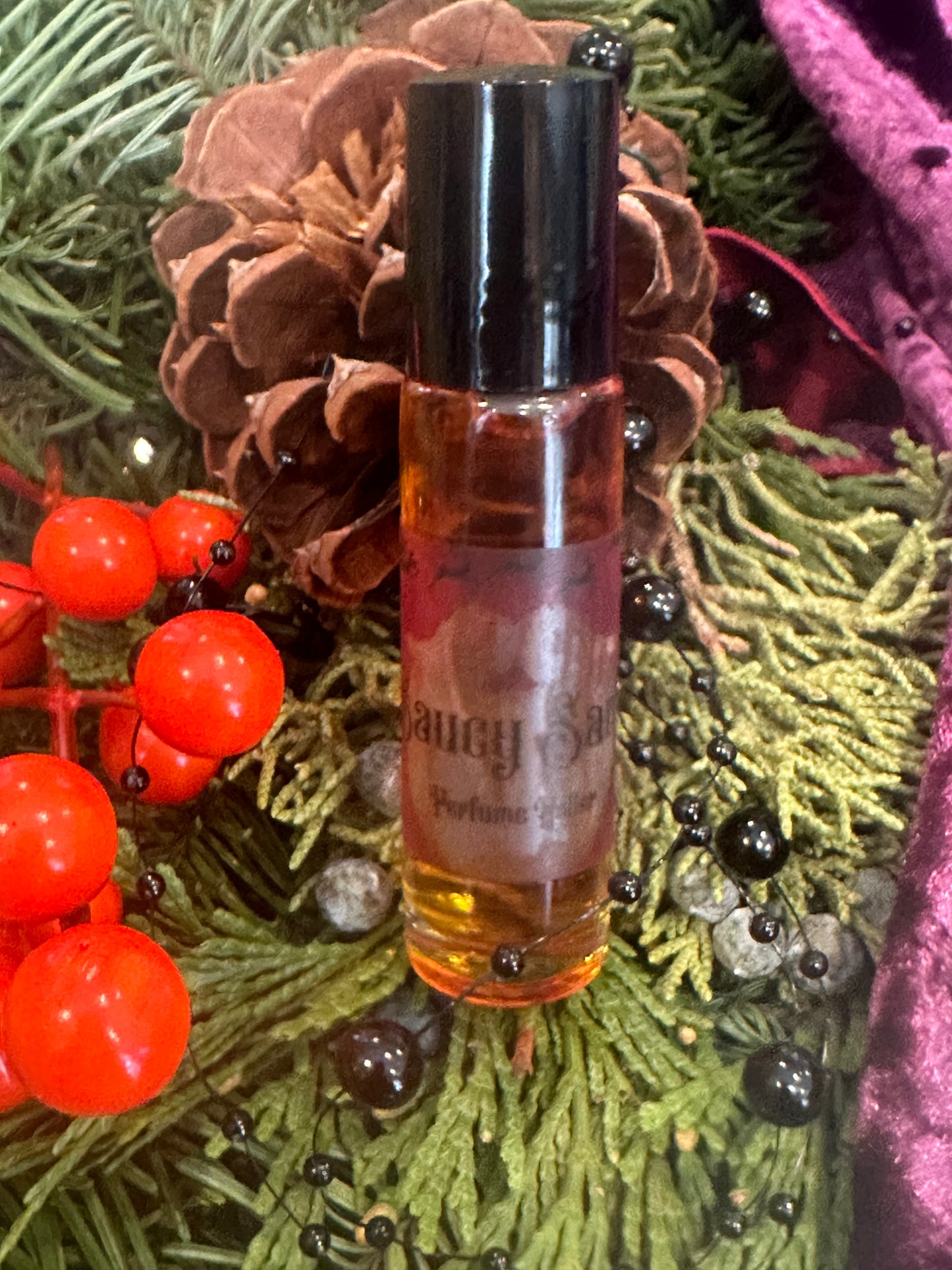 Saucy Santa perfume roller